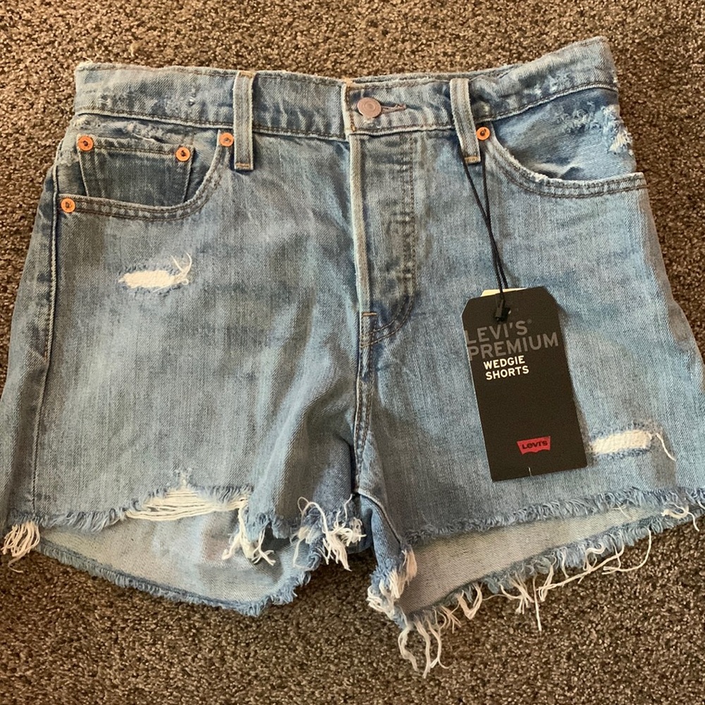 Levi’s distressed wedgie shorts